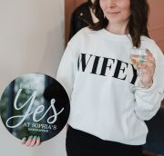 It’s a #sophiasbride tradition – brides grab a photo with the YES sign, celebrate with their favorite people and pop a bottle of complimentary champagne, leaving with the coziest wifey sweatshirt ever.