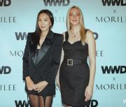 Jiyup Kim, Morilee’s Chief Design Officer (left) was introduced formally at a co-sponsored event with Women’s Wear Daily during a cocktail party after Market hours. Also pictured Emily Mercer, WWD Women’s Fashion Market Editor.