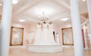 This room contains four bridal dressing rooms, each its own room with all seating in the middle of the room.