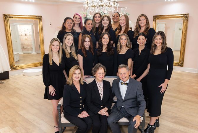 The Poffie Girls bridal staff. (Front row, from L): CEO Pam Nixon, Owners Syble & Bob Latta