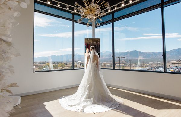 Brides love Something New’s Say Yes Corner, which boasts tons of natural light and a panoramic view of Colorado’s Rocky Mountains.